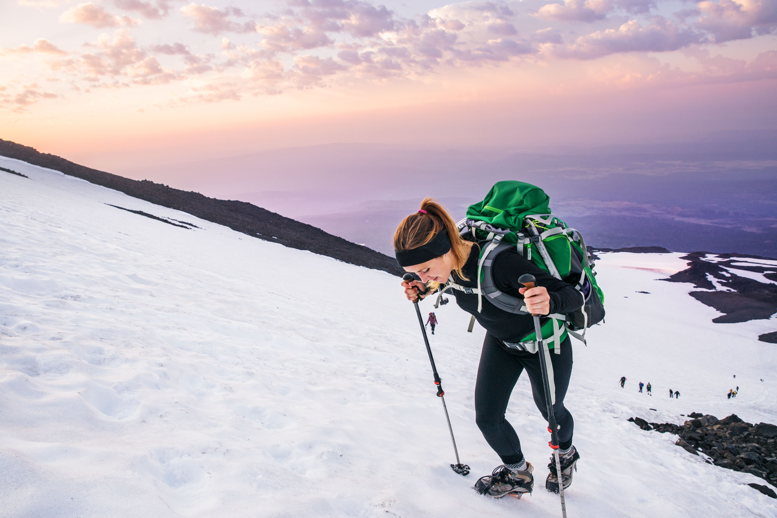 Mountaineer climbing Mt. Adams at sunrise