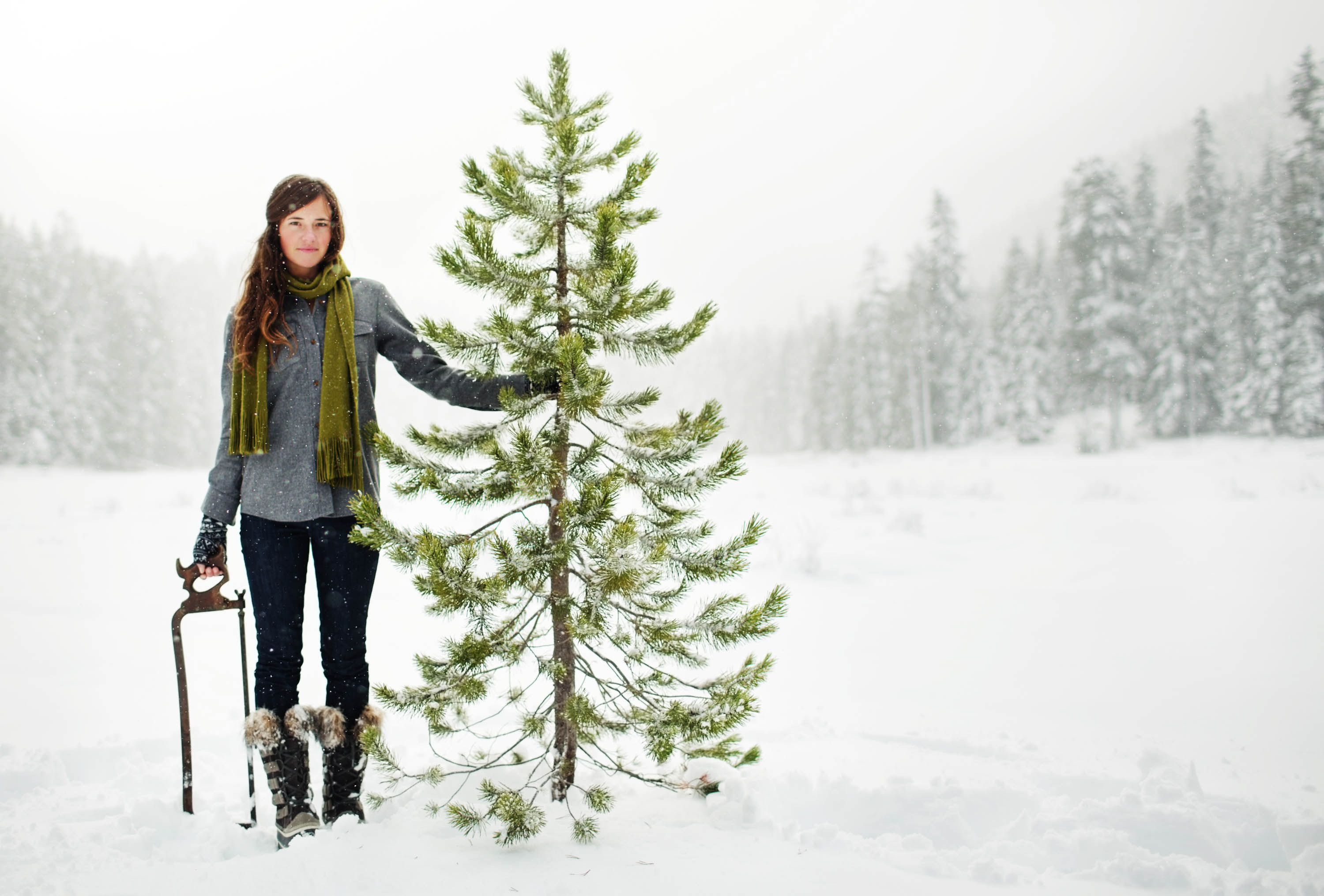 Woman with Christmas tree