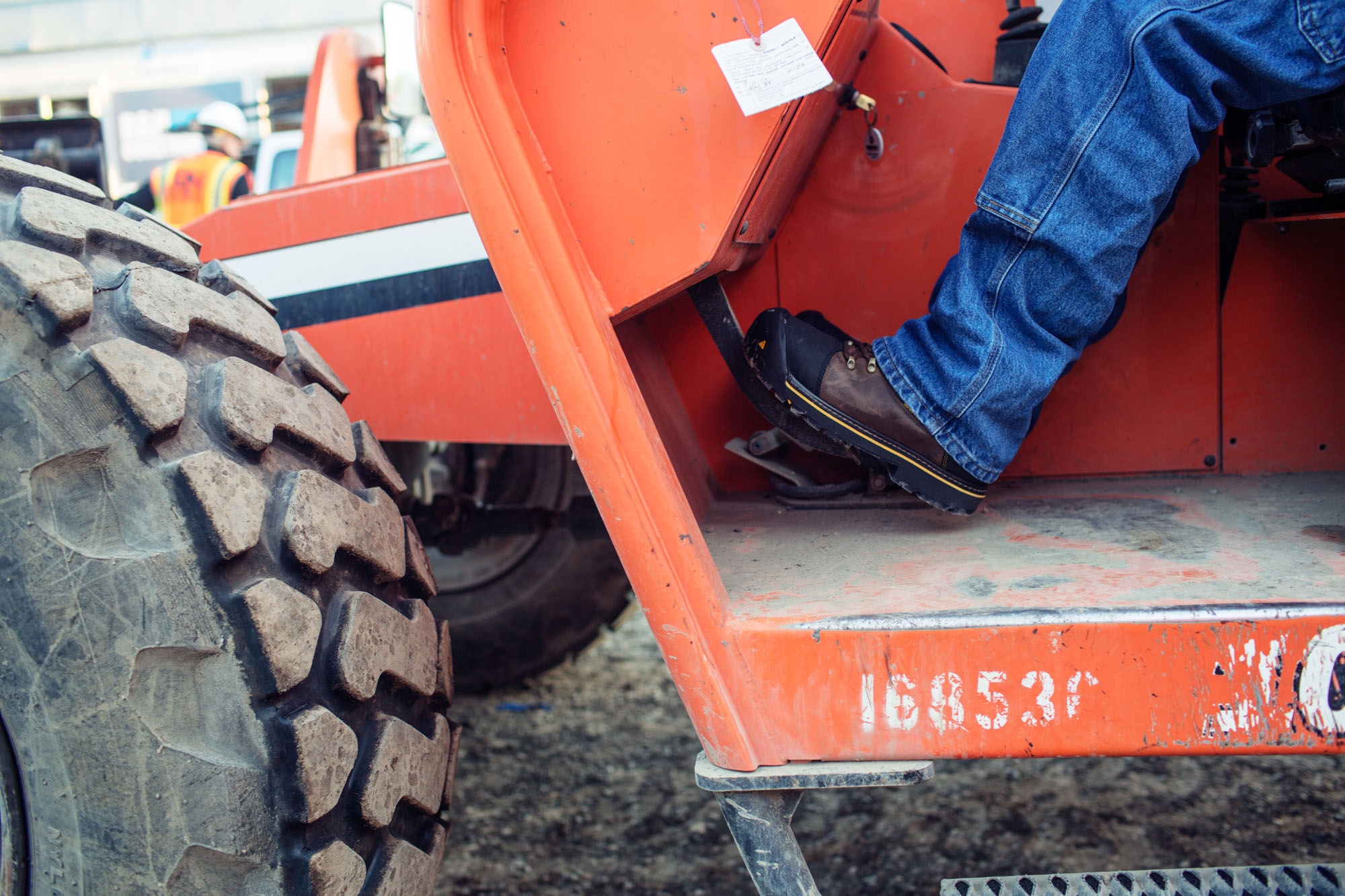 Keen Utility- Man Driving Tractor